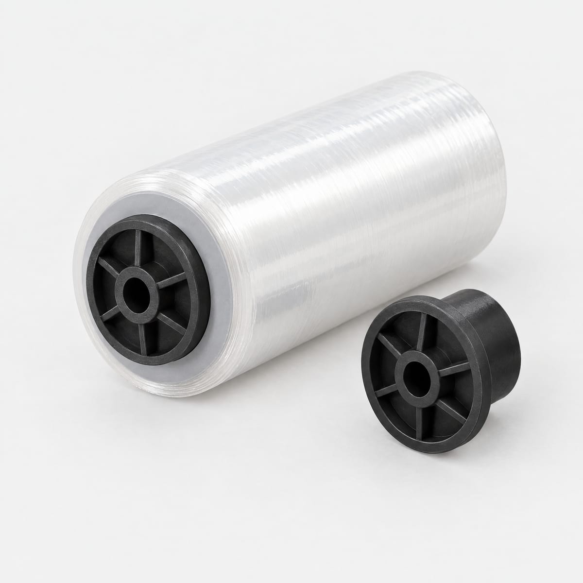 Plastic core plugs fitted in the core of a film roll